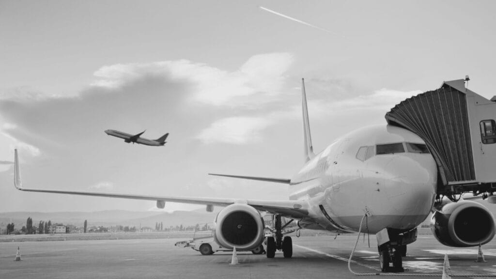 Commercial airplane arriving at the airport, perfect for shuttle services