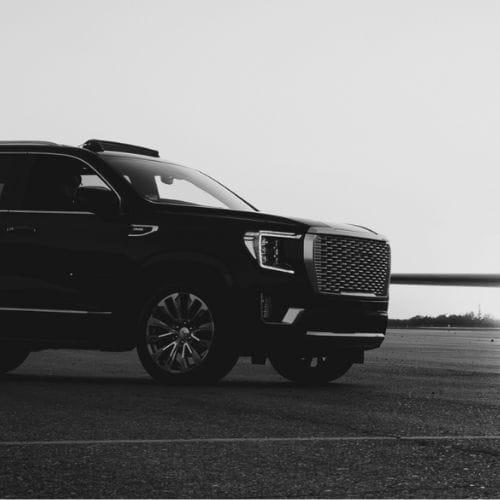 gmc yukon waiting for a airport transfer